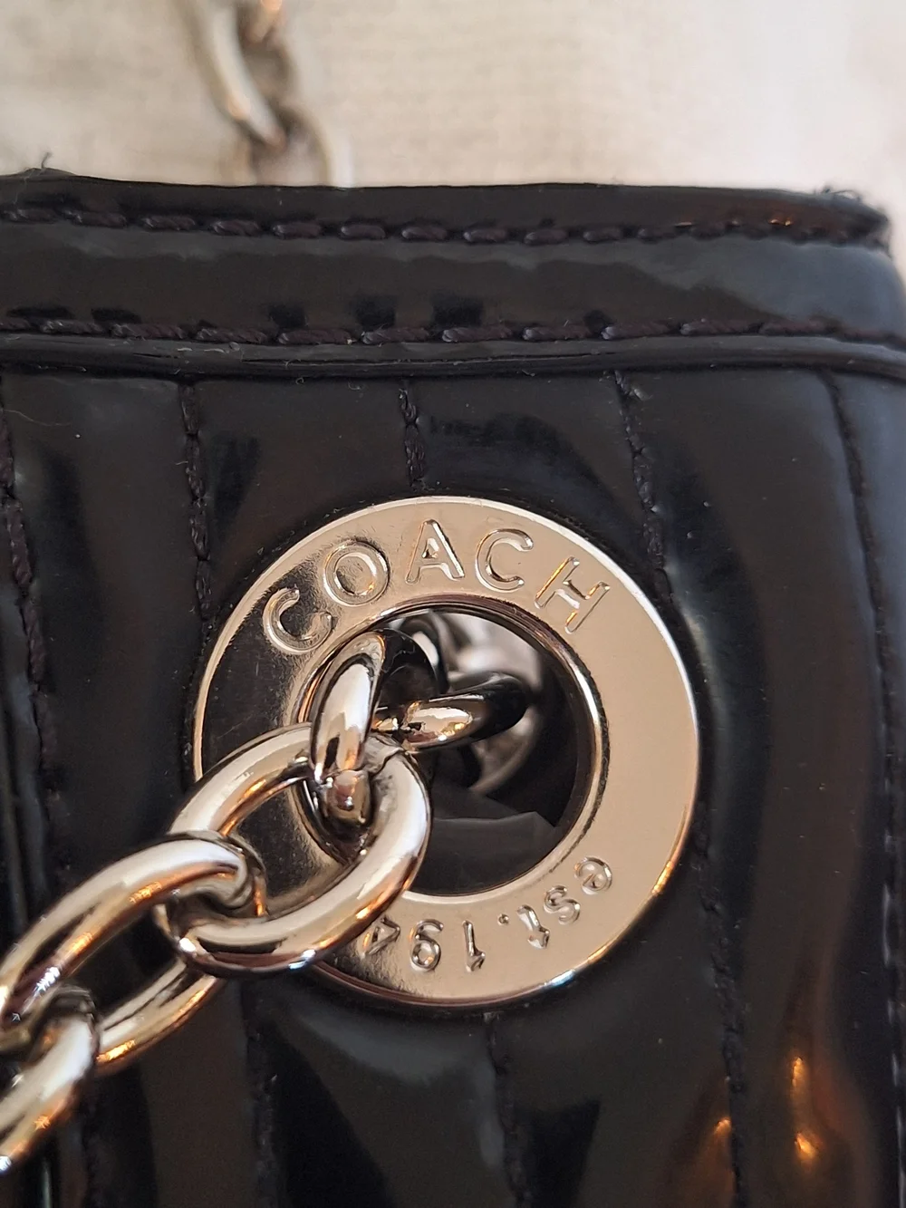 Coach sleek black